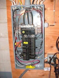 Checking an electrical panel in a home in Portland OR