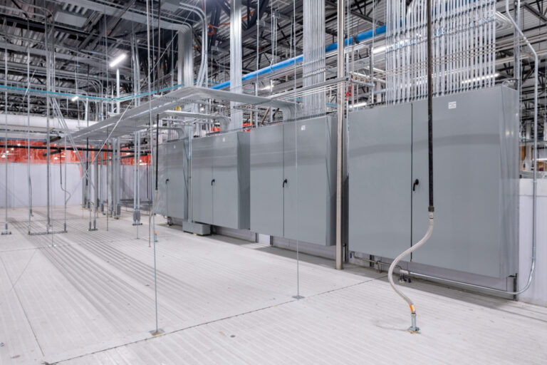 In Vancouver, WA, our electrician services are ideal for expansive industrial spaces. We specialize in installing and maintaining gray control panels, managing overhead piping systems, and integrating lighting fixtures amid exposed beams to enhance your facility's functionality.