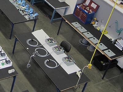 A bird's eye view of a workshop in Vancouver, WA brimming with an array of electrical equipment. This hubspot of activity is operated by proficient local electricians.