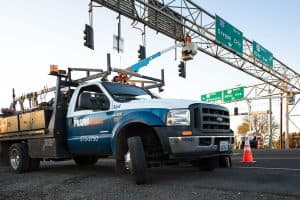 a prairie electric truck working on traffic lights to illustrate traffic signal contractors