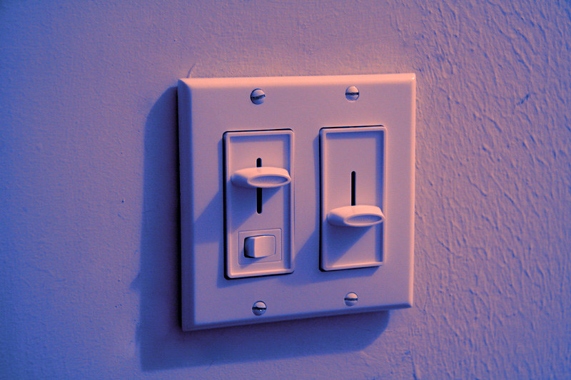 For expert electrician services in Vancouver, WA, consider addressing any buzzing issues with dimmer switches. A white double light switch plate with horizontal sliders can adjust light intensity smoothly but may require troubleshooting to eliminate noise and ensure optimal performance.