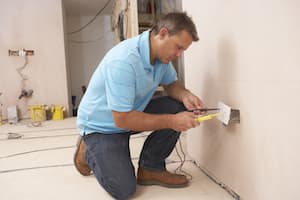 Electrician Installing Wall Socket in Vancouver WA