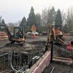 Heavy equipment working on underground electrical systems