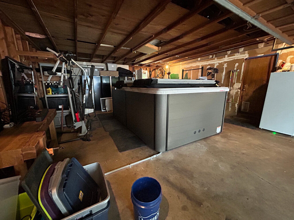 Garage hot tub in Vancouver, WA garage with electricity installed by Prairie Electric.