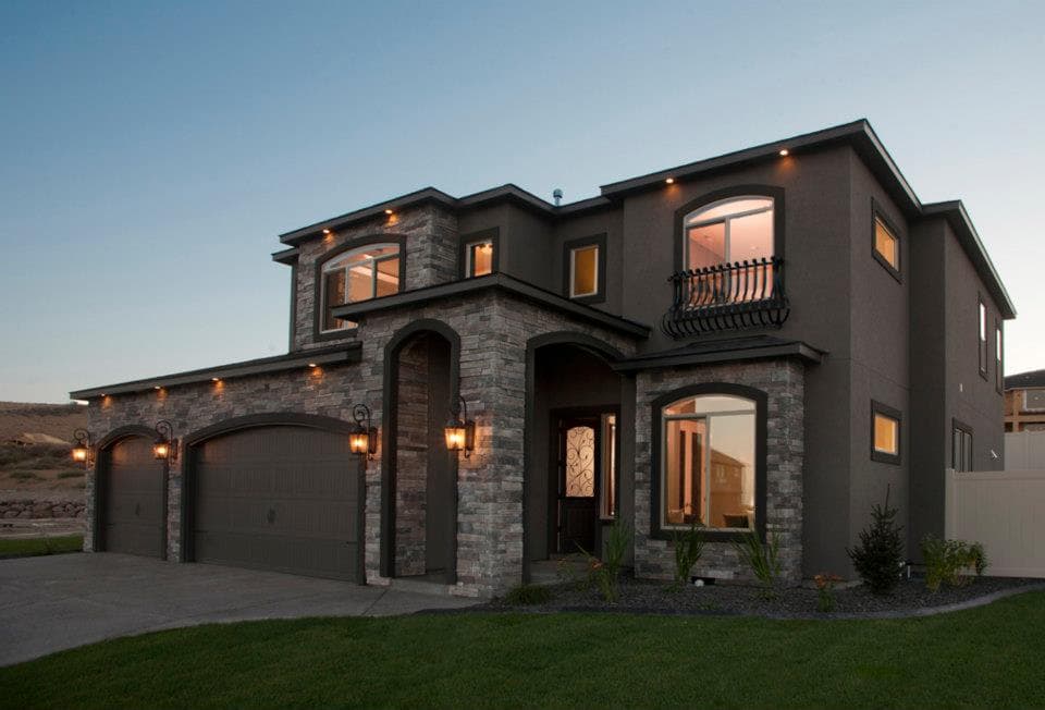 The home, situated in Vancouver, WA, has a facade made of stone. This property is regularly maintained and inspected by local electricians to ensure the safety and efficiency of its electrical system.