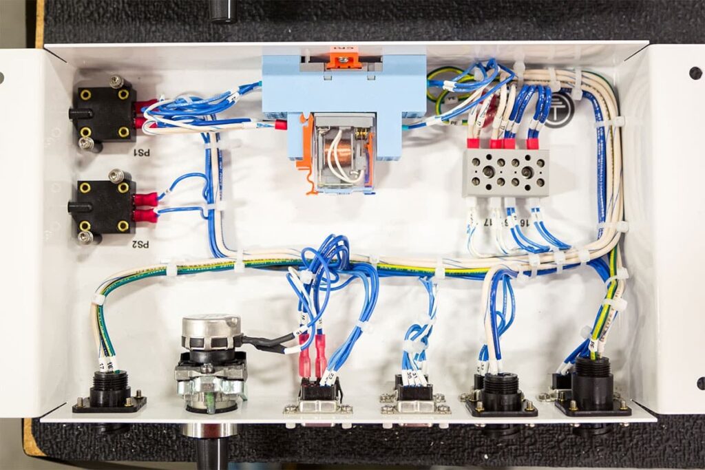 A white box filled with wires in Vancouver, WA, where a local electrician is diligently working.