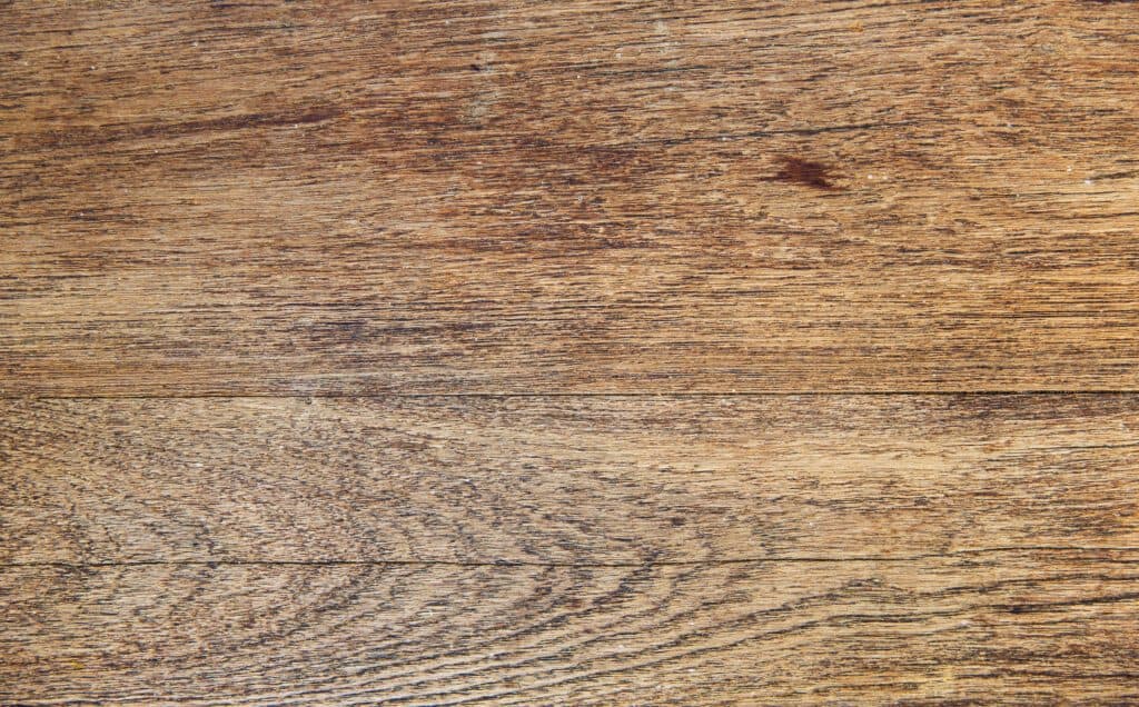 An intimate view of a wooden floor in Vancouver, WA, where local electricians may be at work.