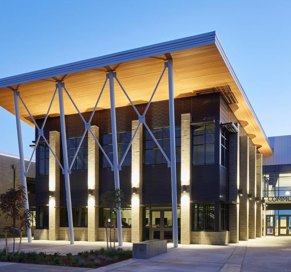 A team of diligent electricians in Vancouver, WA is finishing up their hard day's work at a local school building. Their job, ensuring that the school’s exterior has proper lighting for safety and aesthetics at dusk, showcases their meticulous attention to detail and expertise. These Vancouver based electricians take great pride in providing a safer environment for the community they serve.